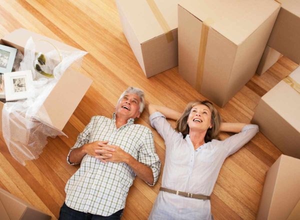 couple-downsize-moving-boxes